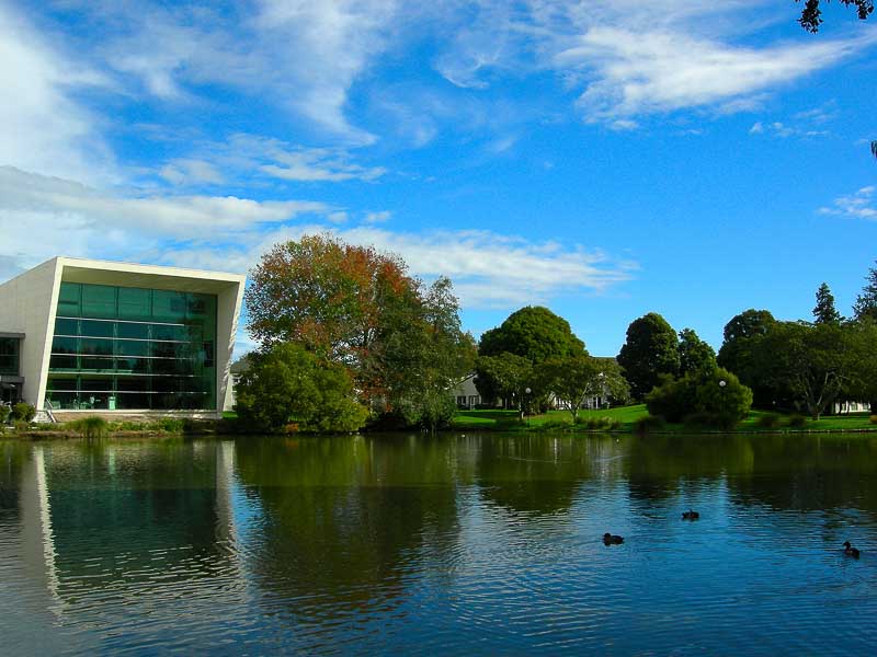 View across the Waikato River of the Academy of Performing Arts, University of Waikato, Hamilton