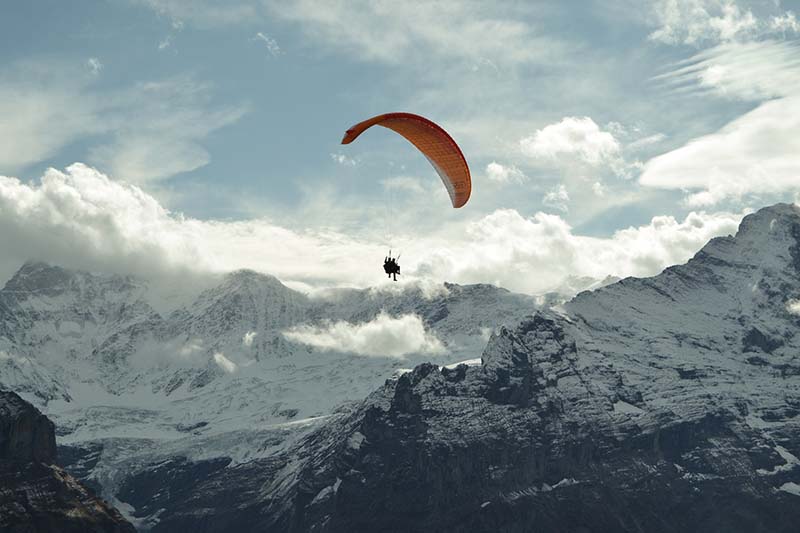 5 Must-Try Adventure Activities in Switzerland 6 Paragliding over the mountains is one of the top five adventure activities in Switzerland