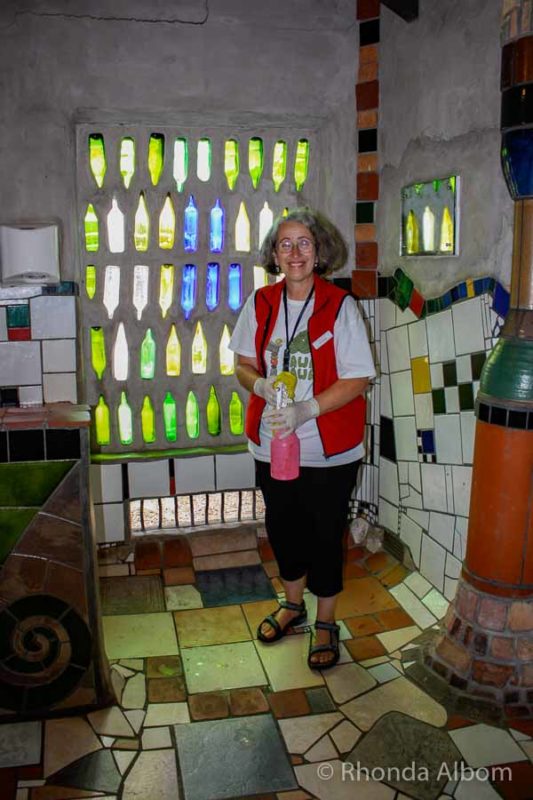 Hundertwasser Toilets: One of Three New Zealand Hundertwasser Designs 6 A tour guide inside the Hundertwasser toilets in Kawakawa