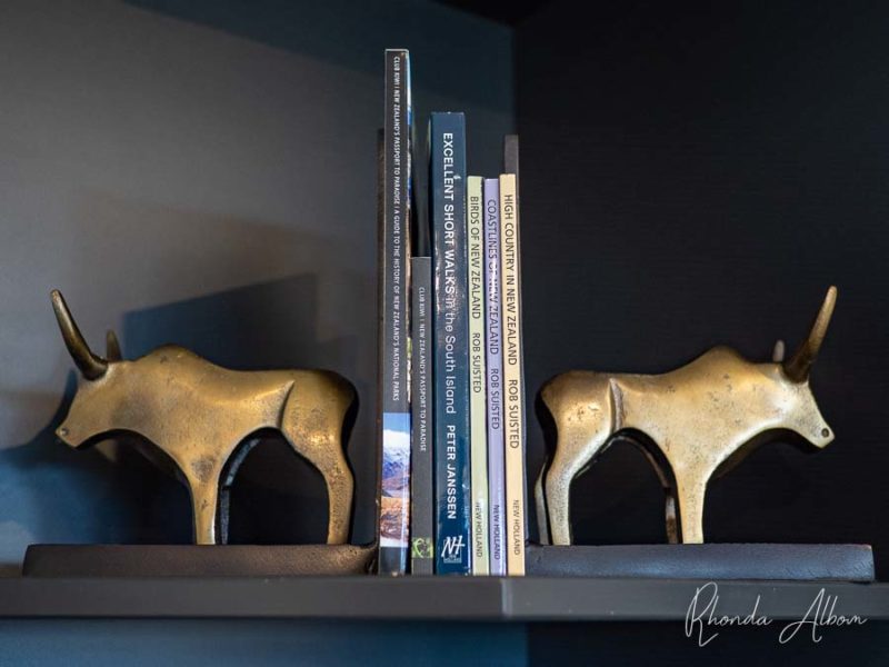 Romantic Getaway Auckland: An Inspired Paradise at Quail Lodge 10 Books on the shelf represent attention to detail in the guest unit of the Quail Lodge in Drury