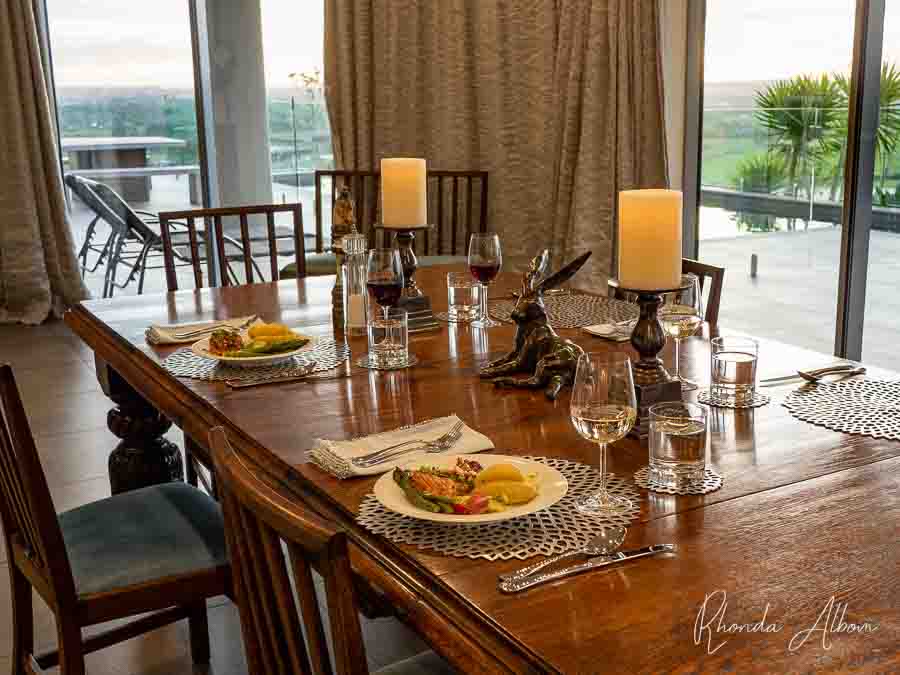 Luxury and Boutique Hotels in Auckland: Relax and Be Pampered 12 Formal table set for dinner plates containing salmon, potato, asparagus and salad at Quail Lodge in Drury, Auckland, New Zealand