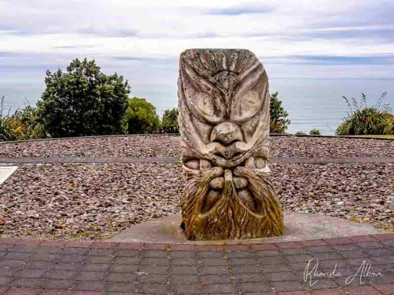 17 Things to Do in Raglan: Unleash Your Adventurous Spirit 9 One of the four sculptures representing the wind directions. This is east or air in Raglan New Zealand