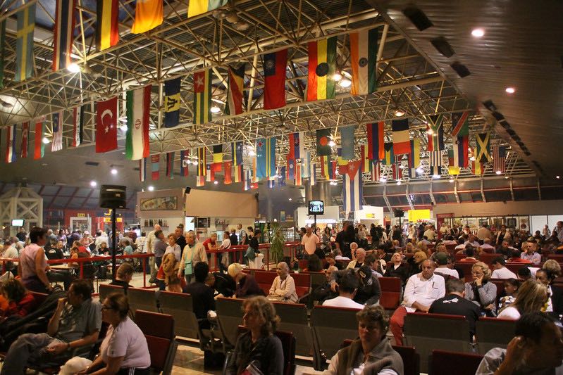 Crowded airport waiting and hoping for an airline delay compensation