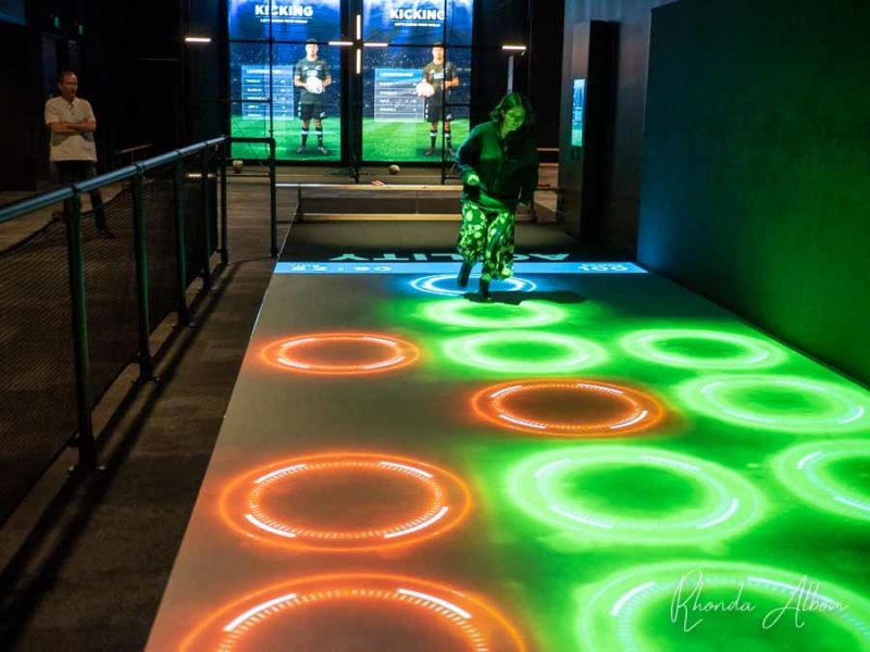 Auckland Activities: 12 One-of-a-Kind Things to Do in Auckland 5 Girl trying the agility course at the All Blacks Experience on of the really cool Auckland Activities in New Zealand