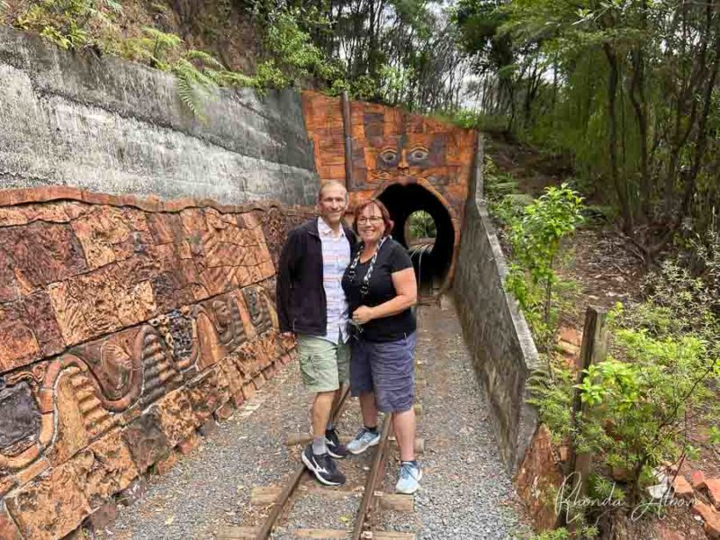 Jeff and Rhonda Albom outside a tunnel in Coromandel, New Zealand 