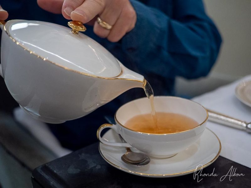 High Tea in Auckland at Cordis: A Luxurious Treat 3 Pouring traditional Earl Grey tea at an Auckland High Tea at Cordis