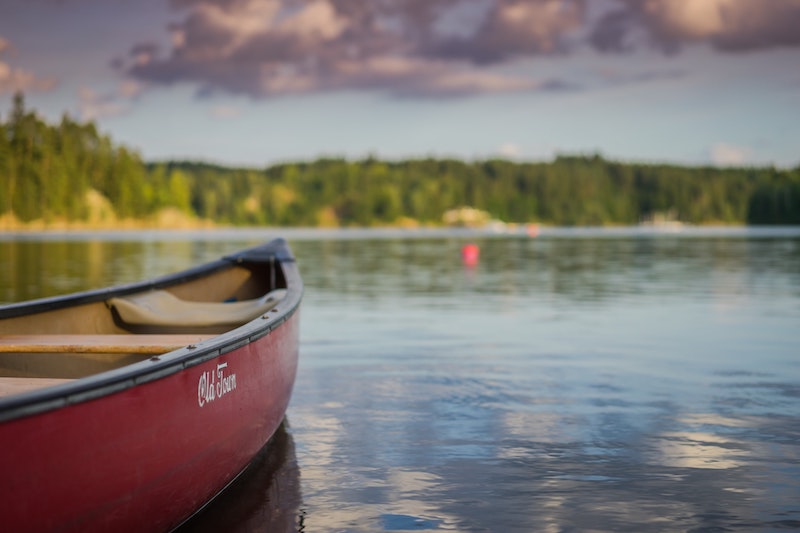 Camping in the West Coast: Best Places in the USA 4 Canoeing on a lake - a great activity while camping in the West coast of the USA