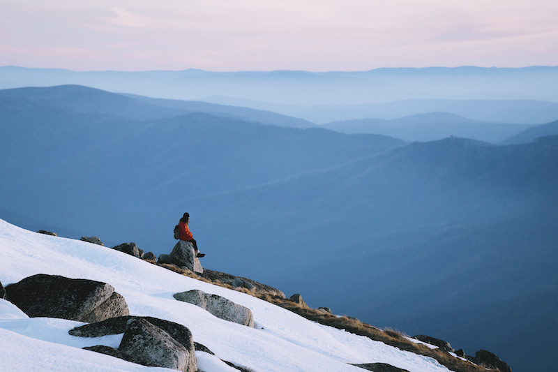 Women enjoying views of Kosciuszko National Park in the winter, one of the best things to do in Jindabyne