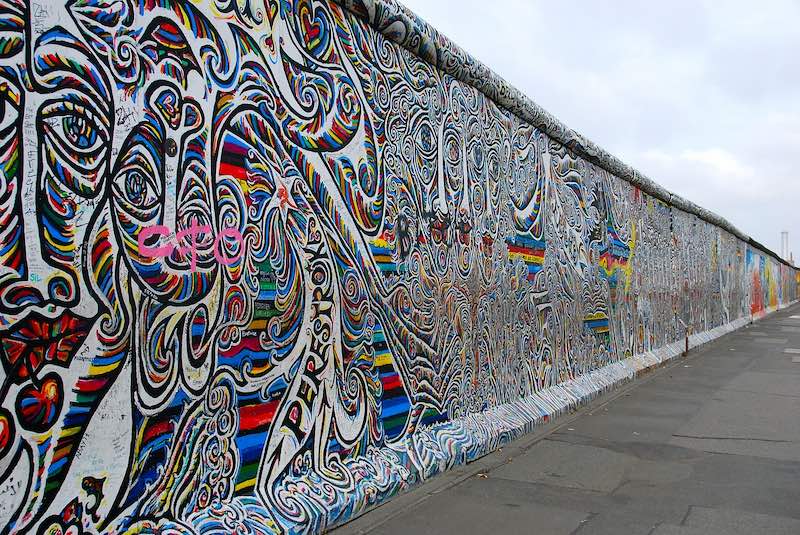 Steet art on a former section of the Berlin Wall at the East Side Gallery