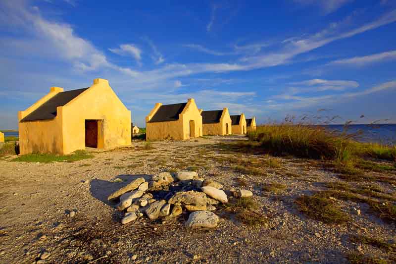 I Got the Bends Scuba Diving in Bonaire: When Dive Computers Fail 4 Historical yellow slave huts on Bonaire, Caribbean
