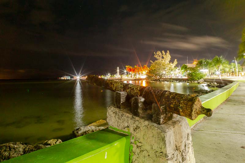 7 Things to Do in Chetumal, Mexico You Don't Want to Miss 2 Night view of old cannon on the boardwalk is one of the things to do in Chetumal Mexico, beachside walk