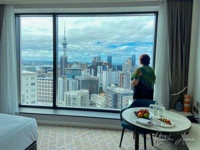 Enjoying huge views of Auckland from the window of our room at Cordis, one the best luxury boutique hotels in Auckland New Zealand.