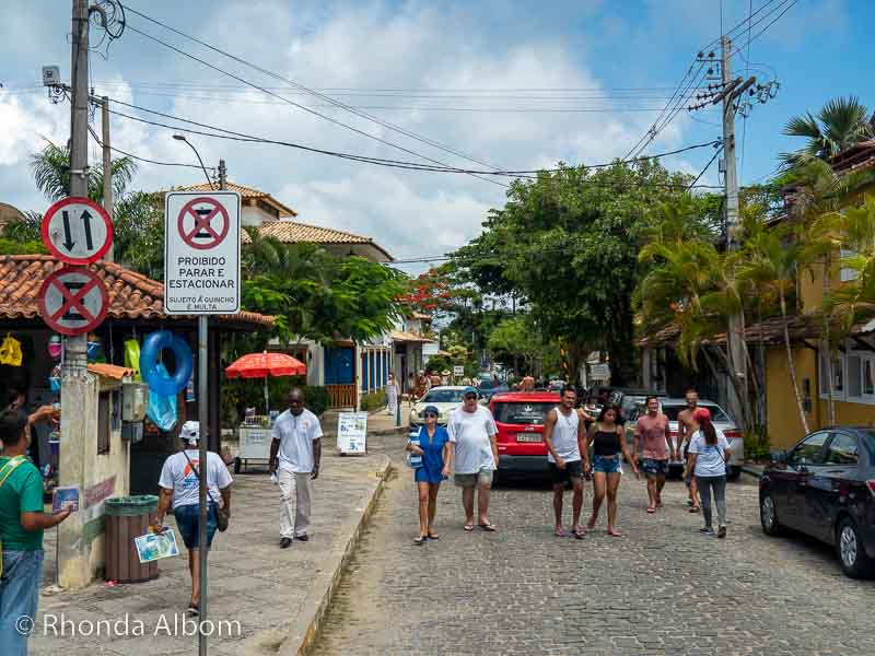 Street leading to Praia dos Ossos, a calm and clear cove filled with fishing boats, nicknamed bones beach.