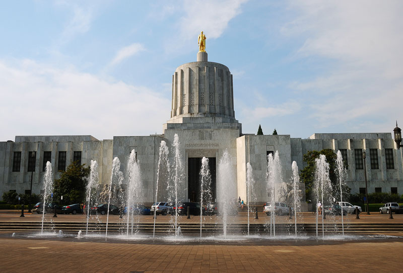 9 Unforgettable Portland Day Trips: Unleashing the Magic 7 Oregon State Capitol building built in 1938 in Salem Oregon. Atop the marble dome sits the statue "Gold Pioneer".