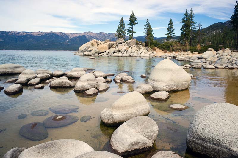 Driving Around Lake Tahoe in One Day: Discover its Secrets 12 Smooth Rocks Clear Water Lake Tahoe Sand Harbor Beach in Lake Tahoe