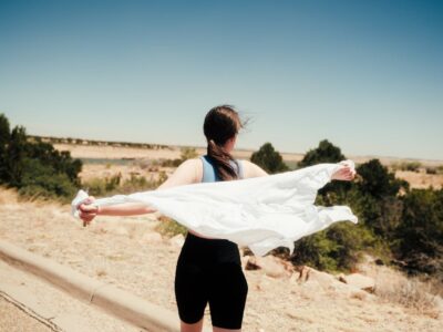 Woman making the most of her desert adventure in California.
