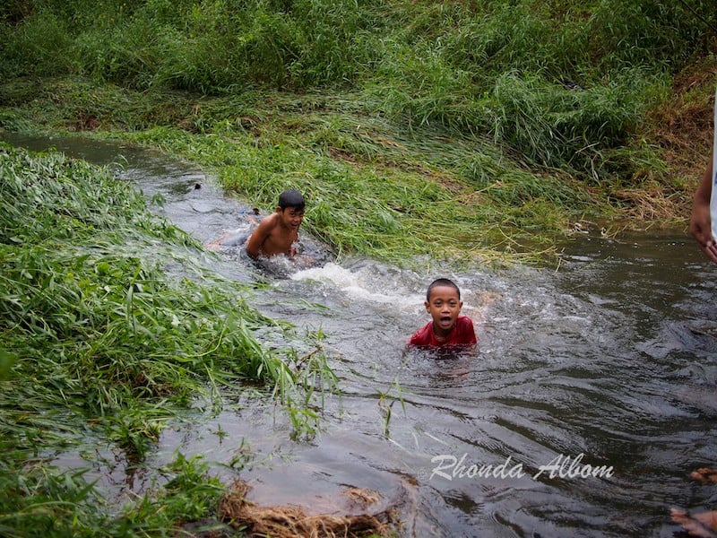 The boys took a swim in the stream on the way to Fuipisia Falls in Samoa