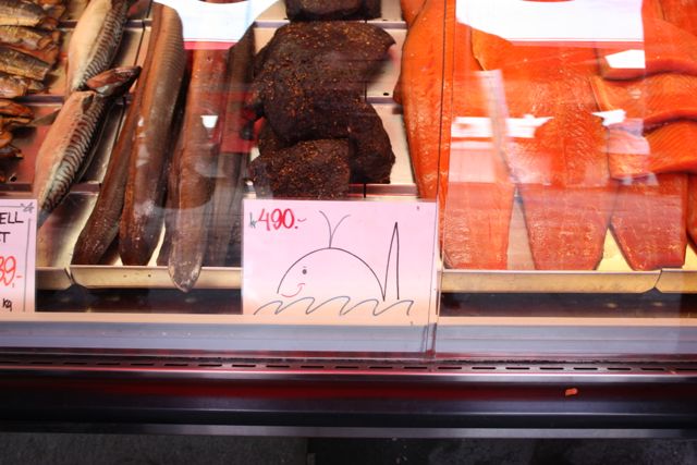 Selling whale meat, this counter also offered a free sample of whale meat in Bergen Norway Selling whale meat, this counter also offered a free sample of whale meat in Bergen Norway