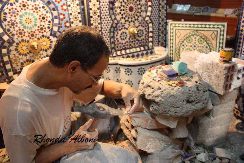 Creating Mosaic by Carving One Tiny Tile at a Time requires patience and expert craftsmanship Creating Mosaic by Carving One Tiny Tile at a Time requires patience and expert craftsmanship