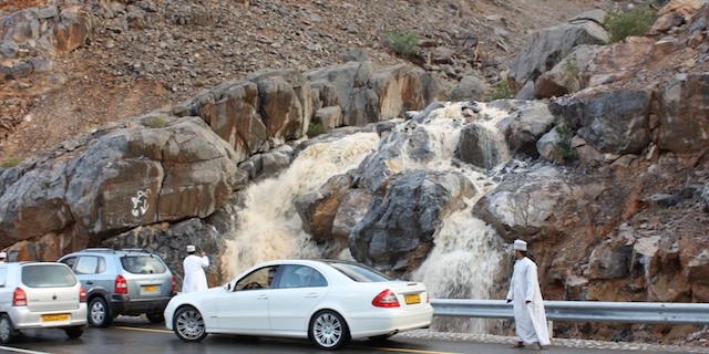 Rain water so heavy it looks like a waterfall - (Desert Floods in Oman, April 2012) Rain water so heavy it looks like a waterfall - (Desert Floods in Oman, April 2012)