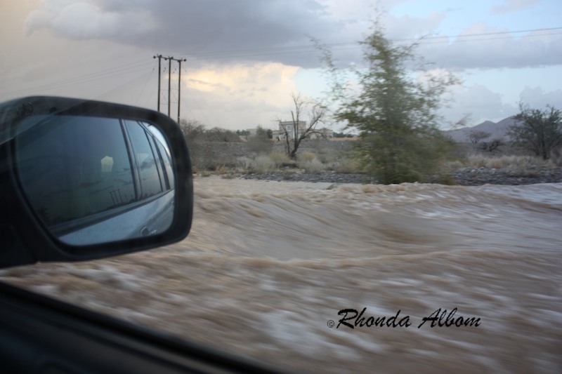 Deep flood waters outside our car window during flash floods in the normally dry desert of Oman, April 2012 Deep flood waters outside our car window during flash floods in the normally dry desert of Oman, April 2012