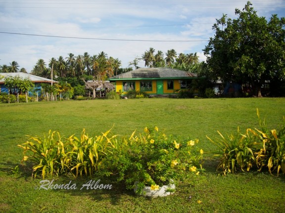 Resort Life vs Living in Samoa: My Window into the Contrasting Lifestyles 10 A modern home with a beautifully manicured yard highlights life in Samoa