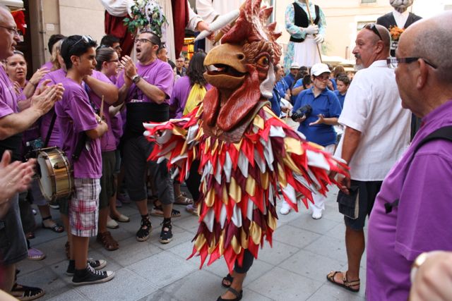 giant chicken Palamos giants parade - chicken costumed performer